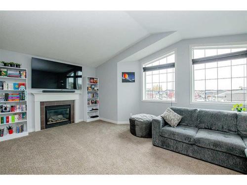 7105 88 Street, Grande Prairie, AB - Indoor Photo Showing Living Room With Fireplace