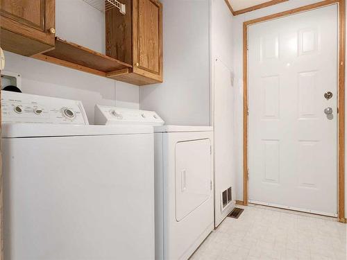 221 Mawdsley Crescent, Grande Cache, AB - Indoor Photo Showing Laundry Room