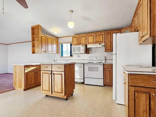 221 Mawdsley Crescent, Grande Cache, AB - Indoor Photo Showing Kitchen