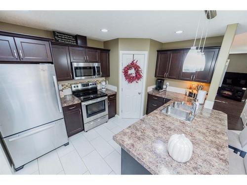 8730 72 Avenue, Grande Prairie, AB - Indoor Photo Showing Kitchen With Stainless Steel Kitchen With Double Sink