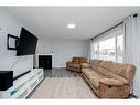 4901 51 Street, Valleyview, AB  - Indoor Photo Showing Living Room With Fireplace 