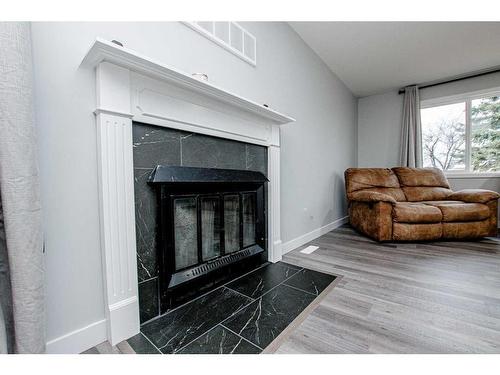 4901 51 Street, Valleyview, AB - Indoor Photo Showing Living Room With Fireplace