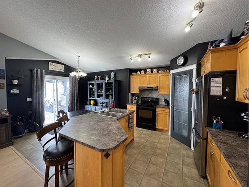 8810 113 Avenue, Grande Prairie, AB - Indoor Photo Showing Kitchen With Double Sink