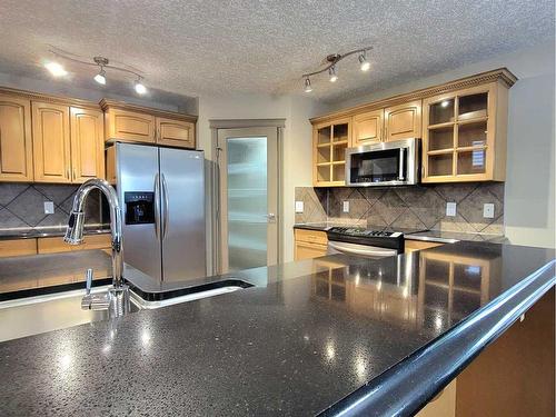 11041 66 Avenue North, Grande Prairie, AB - Indoor Photo Showing Kitchen With Stainless Steel Kitchen