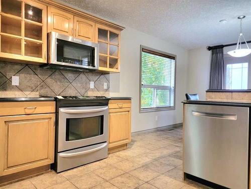 11041 66 Avenue North, Grande Prairie, AB - Indoor Photo Showing Kitchen With Stainless Steel Kitchen