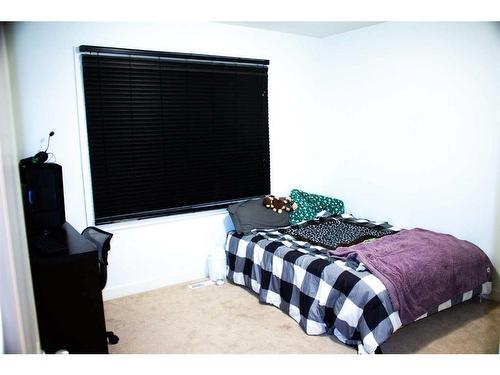 11307 91 Street, Peace River, AB - Indoor Photo Showing Bedroom