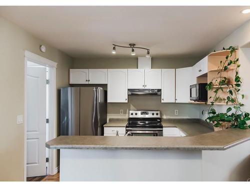 3 Pinnacle Boulevard, Grande Prairie, AB - Indoor Photo Showing Kitchen