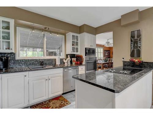 9906 105 Avenue, Grande Prairie, AB - Indoor Photo Showing Kitchen With Double Sink