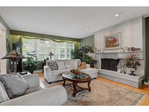 9906 105 Avenue, Grande Prairie, AB - Indoor Photo Showing Living Room With Fireplace