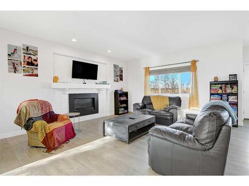 10414 135 Avenue, Grande Prairie, AB - Indoor Photo Showing Living Room With Fireplace