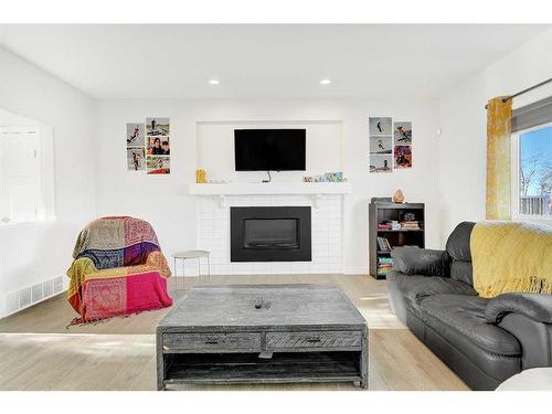 10414 135 Avenue, Grande Prairie, AB - Indoor Photo Showing Living Room With Fireplace