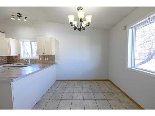 8942 64 Avenue, Grande Prairie, AB - Indoor Photo Showing Kitchen With Double Sink