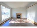 8942 64 Avenue, Grande Prairie, AB  - Indoor Photo Showing Living Room With Fireplace 