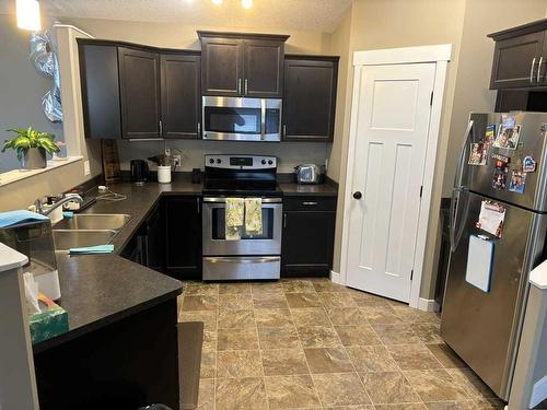 11550 73 Avenue, Grande Prairie, AB - Indoor Photo Showing Kitchen With Double Sink