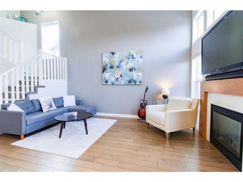 10402 135 Avenue, Grande Prairie, AB - Indoor Photo Showing Living Room With Fireplace