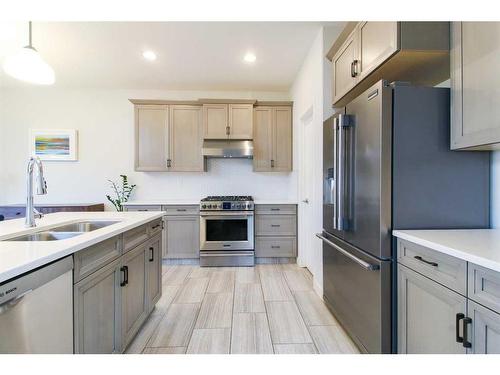 10402 135 Avenue, Grande Prairie, AB - Indoor Photo Showing Kitchen With Stainless Steel Kitchen With Double Sink With Upgraded Kitchen