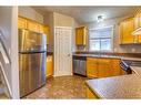 7141 114A Street, Grande Prairie, AB  - Indoor Photo Showing Kitchen With Double Sink 