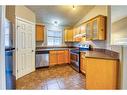 7141 114A Street, Grande Prairie, AB  - Indoor Photo Showing Kitchen With Double Sink 