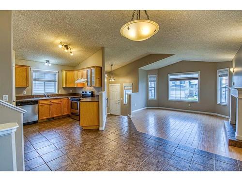 7141 114A Street, Grande Prairie, AB - Indoor Photo Showing Kitchen With Fireplace