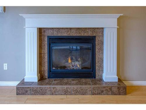 7141 114A Street, Grande Prairie, AB - Indoor Photo Showing Living Room With Fireplace