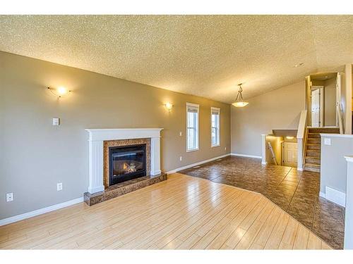 7141 114A Street, Grande Prairie, AB - Indoor Photo Showing Living Room With Fireplace