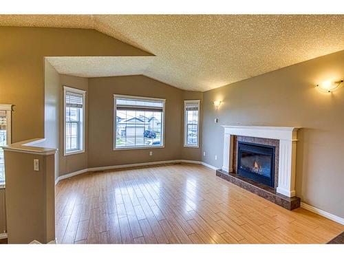 7141 114A Street, Grande Prairie, AB - Indoor Photo Showing Living Room With Fireplace