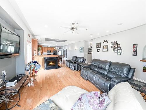 513 1St B Street Sw, Falher, AB - Indoor Photo Showing Living Room With Fireplace