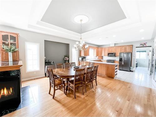 513 1St B Street Sw, Falher, AB - Indoor Photo Showing Dining Room With Fireplace