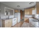 7413 98B St, Peace River, AB  - Indoor Photo Showing Kitchen With Double Sink 