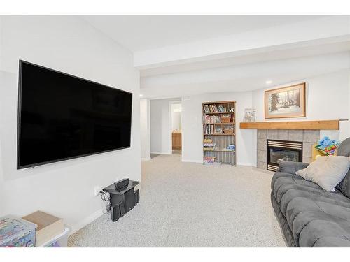 9514 91 Street, Grande Prairie, AB - Indoor Photo Showing Living Room With Fireplace