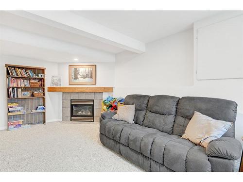 9514 91 Street, Grande Prairie, AB - Indoor Photo Showing Living Room With Fireplace