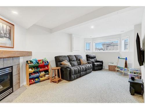 9514 91 Street, Grande Prairie, AB - Indoor Photo Showing Living Room With Fireplace