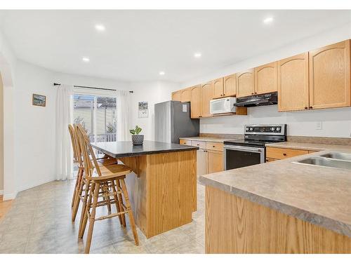 9514 91 Street, Grande Prairie, AB - Indoor Photo Showing Kitchen With Double Sink