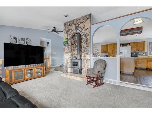 821050 Hwy 732, Rural Fairview No. 136, M.D. Of, AB - Indoor Photo Showing Living Room With Fireplace