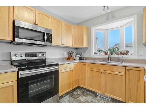 9212 94 Avenue, Grande Prairie, AB - Indoor Photo Showing Kitchen With Double Sink