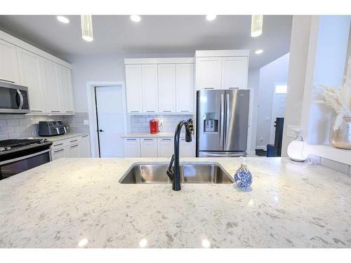 8518 71A Avenue, Grande Prairie, AB - Indoor Photo Showing Kitchen With Stainless Steel Kitchen With Double Sink