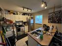 108-10150 121 Avenue, Grande Prairie, AB  - Indoor Photo Showing Kitchen With Double Sink 