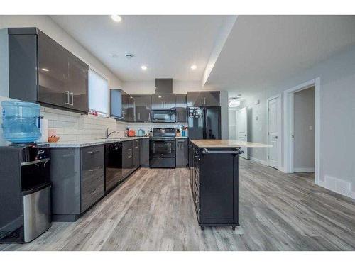 A/B-9067 80 Avenue, Grande Prairie, AB - Indoor Photo Showing Kitchen