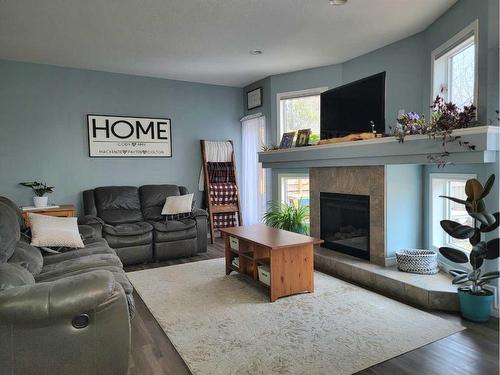 8542 69 Avenue, Grande Prairie, AB - Indoor Photo Showing Living Room With Fireplace