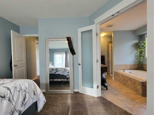 8542 69 Avenue, Grande Prairie, AB - Indoor Photo Showing Bedroom