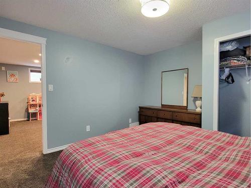 8542 69 Avenue, Grande Prairie, AB - Indoor Photo Showing Bedroom