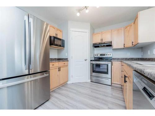 8709 65 Avenue, Grande Prairie, AB - Indoor Photo Showing Kitchen