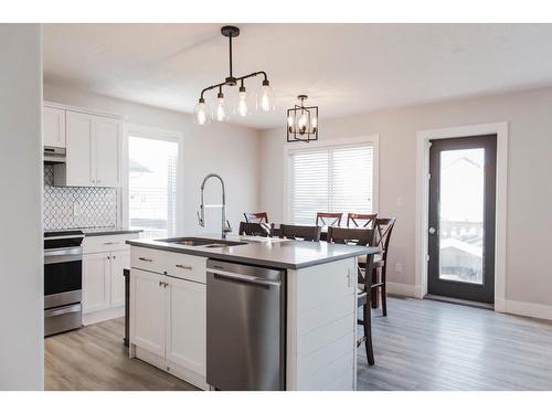 12014 103B Street, Grande Prairie, AB - Indoor Photo Showing Kitchen With Stainless Steel Kitchen With Double Sink With Upgraded Kitchen