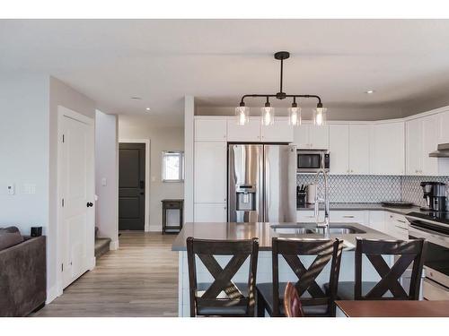 12014 103B Street, Grande Prairie, AB - Indoor Photo Showing Kitchen With Stainless Steel Kitchen With Double Sink