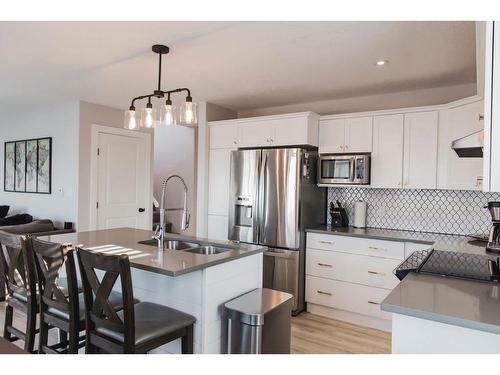 12014 103B Street, Grande Prairie, AB - Indoor Photo Showing Kitchen With Stainless Steel Kitchen With Double Sink With Upgraded Kitchen