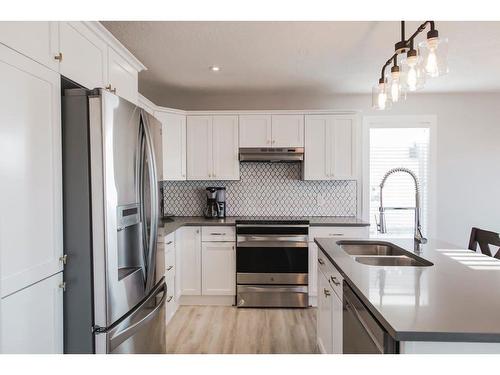 12014 103B Street, Grande Prairie, AB - Indoor Photo Showing Kitchen With Stainless Steel Kitchen With Double Sink With Upgraded Kitchen