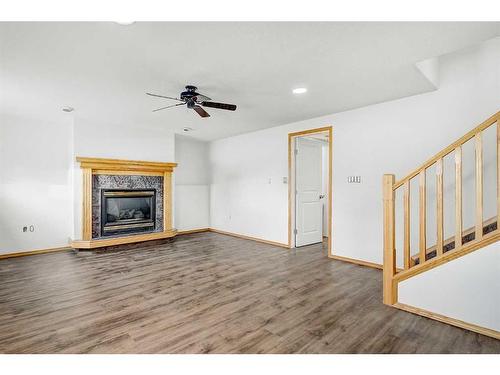 8883 108 Avenue, Grande Prairie, AB - Indoor Photo Showing Living Room With Fireplace