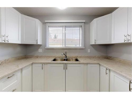 9413 125 Avenue, Grande Prairie, AB - Indoor Photo Showing Kitchen With Double Sink