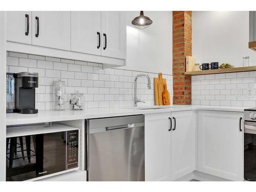 103-9810 96 Street, Grande Prairie, AB - Indoor Photo Showing Kitchen