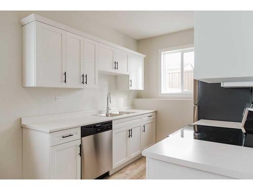 9507 114 Avenue, Clairmont, AB - Indoor Photo Showing Kitchen With Double Sink